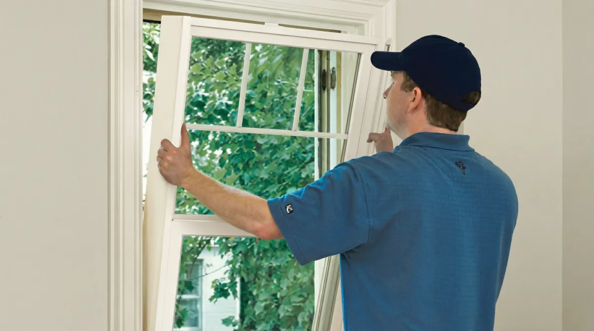 Professional contractors performing a residential window insulation and replacement service in Oakland, CA